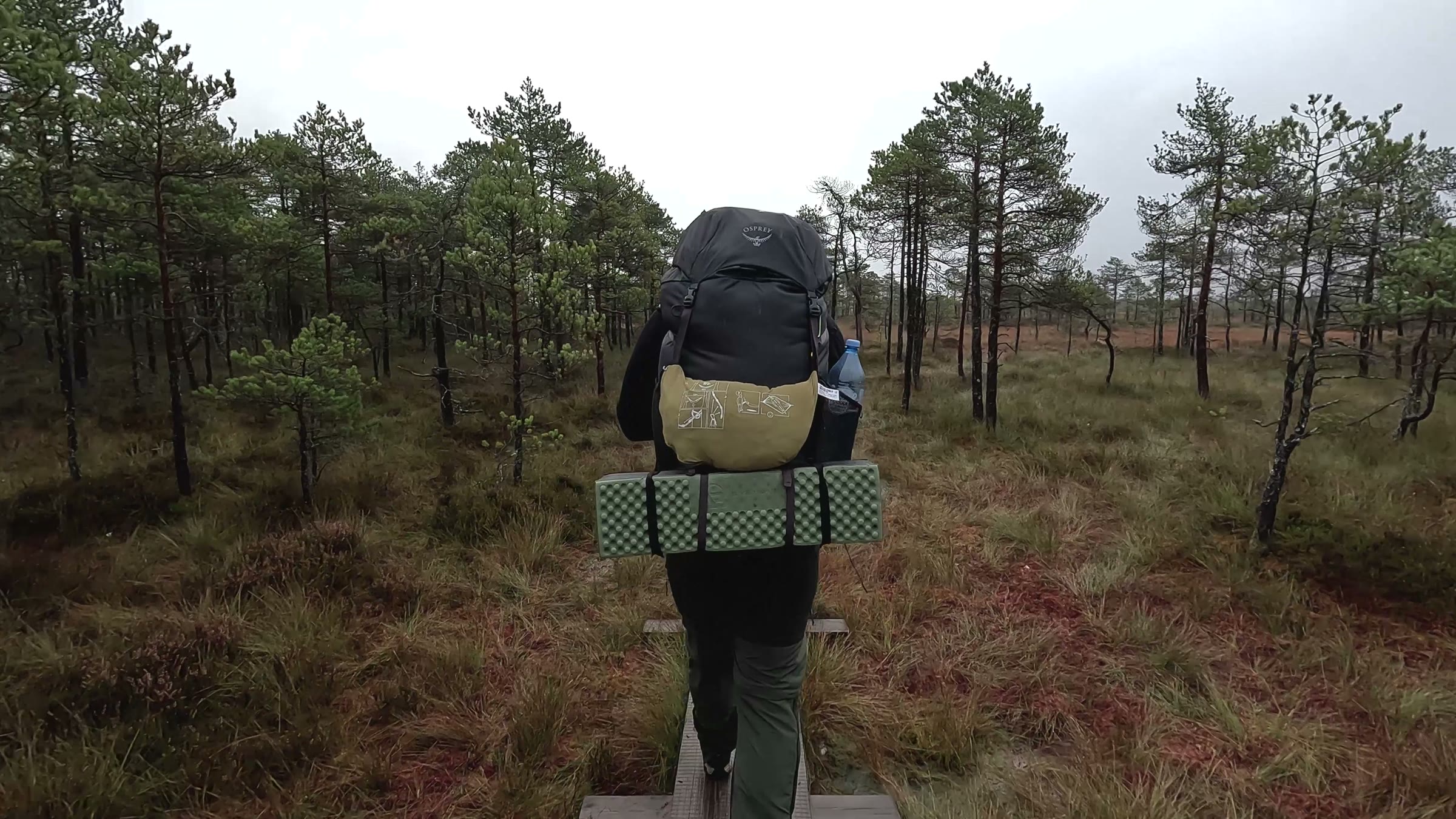 The Osprey Rook 65 on the boardwalk into Kakerdaja bog